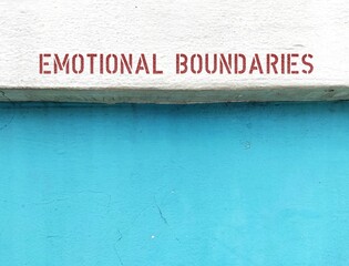 Text copy space blue background Emotional Boundaries  -  frontier and bounding line which gives one sense of entitlement - personal space and privacy to conserve emotional energy and control emotions