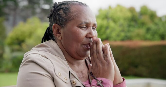 Senior woman, praying and outdoor in nature for holy spirit, christ and faith for guidance, gratitude or calm. Christianity, peace and ask for support, jesus and believe in god, hands and religion