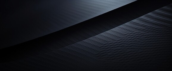 Abstract dark backgroud shallow depth of field carbon fiber texture