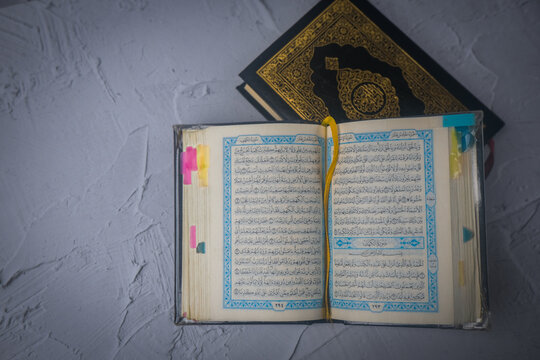 An open page of Holy Quran, Al Kahf.