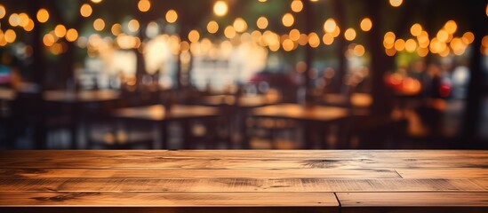 Brown wooden table with blur background in a coffee shop with bokeh image