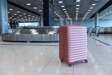 Luggage or baggage at baggage claim conveyor belt in the airport.