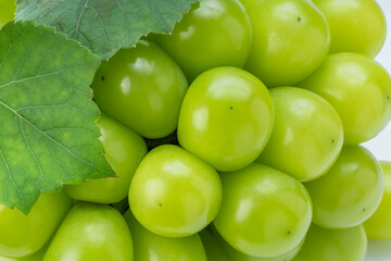 Shiny Shine Muscat with leaves, Close up shot of Fresh Green shine grape.