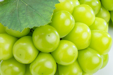 Shiny Shine Muscat with leaves, Close up shot of Fresh Green shine grape. - Powered by Adobe