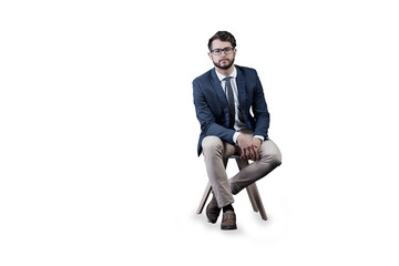 Portrait, glasses and business man on chair isolated on a transparent png background in Spain....