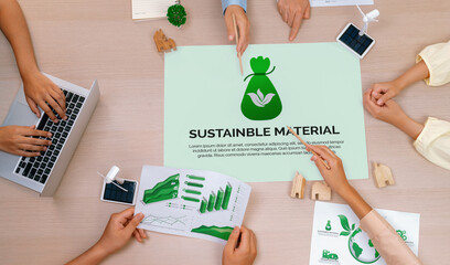 Sustainable material illustration placed on a meeting table during a green business meeting...