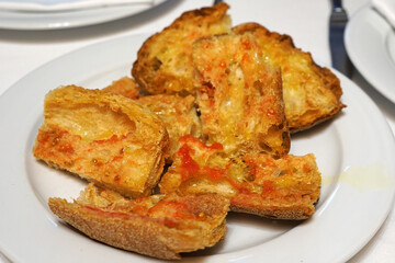Close up Pan con Tomate (Pa amb tomàquet), bread toast with tomato- Classic traditional Spanish tapas