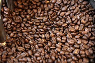 Coffee beans in a coffee grinder. Coffee beans background