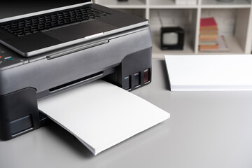 Close up of modern printer in the office