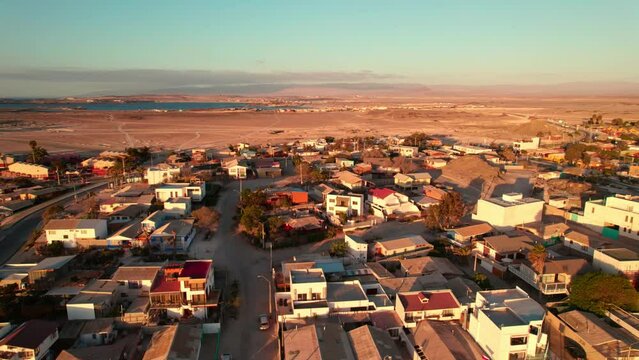 Aerial establishing shot of Coquimbo and Bahia Inglesa beach at sunset in Chile