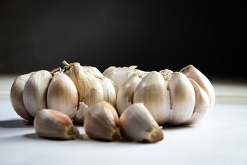 Garlic bulb and clove isolated. Garlic bulbs with cloves on white background. Garlic bulb composition. With clipping path. Full depth of field.