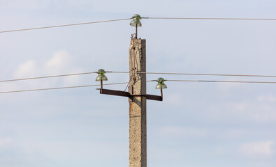 Electric pole against the sky