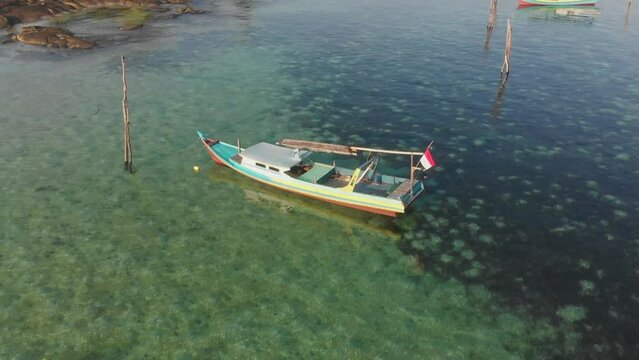 Flying towards traditional fishing boat at Belitung Indonesia, aerial