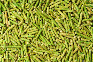 Green filler for cat litter box close up