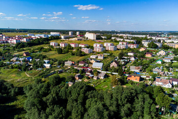 A drone view of the outskirts of an urban area with low- and mid-rise residential buildings. Balabanovo city, Kaluga region, Russia