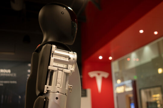 Tigard, OR, USA - Nov 30, 2023: Tesla Bot, aka Optimus, a general purpose, bi-pedal, autonomous humanoid robot capable of performing unsafe, repetitive or boring tasks, is seen at a Tesla showroom.