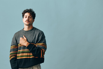 Man expression copyspace portrait trendy handsome fashion hipster face smile sweater