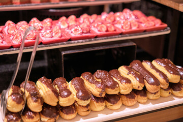 Lemon desserts gleam in soft light, their citrus zest aligning with a zest for life. They echo the popularity of refreshing flavors.