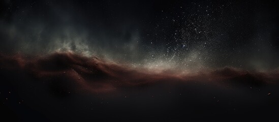 Dust particles flying on dark background.