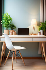 Fototapeta premium Interior of a cozy workplace with a laptop at home in Scandinavian style