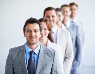Happy man, portrait and leader with team in row, workforce, and ready for hiring process. Worker,...