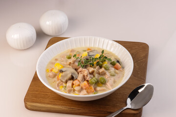 Sup Krim Ayam is a Bowl of Creamy Chicken and Vegetable Soup.