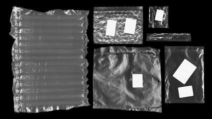 set of plastic bags with stickers on black background, texture looks blank and shiny, plastic...