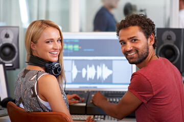 Man, woman and audio engineer with computer, portrait and headphones in recording studio for music....