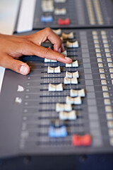 Recording studio, hand and mixing on sound board with dj, technology and media on desk. Music,...