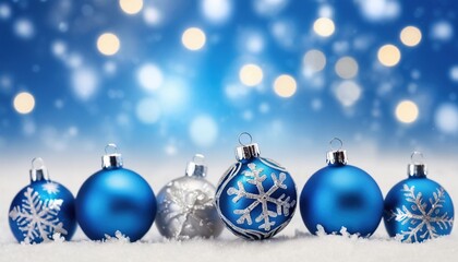 Obraz premium Blue christmas balls with snowflakes on bokeh background