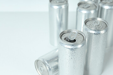 Tin cans for drinks on a white background