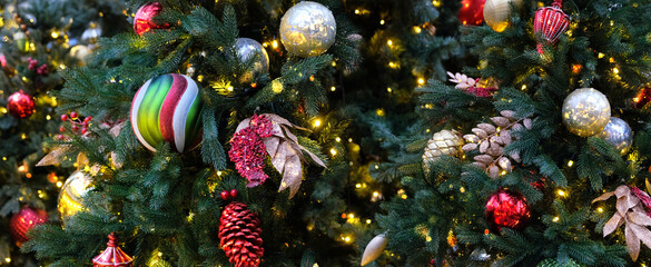 Christmas background. beautiful festive decorations on christmas tree, abstract bright backdrop....