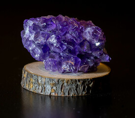amethyst mineral on a black background