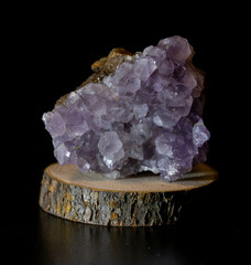 amethyst mineral on a black background