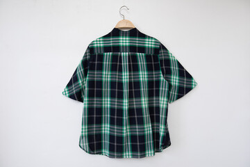 green blouse on a white background.