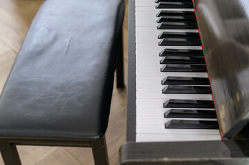 Unleash your musical passion with the dramatic presence of a black and white grand piano, a symbol...