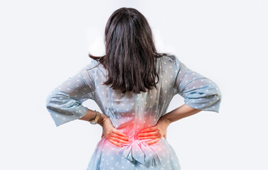 Girl with spine problems isolated. Woman with back pain on isolated background. lumbar problems...