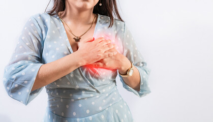 Unrecognizable woman with chest pain isolated. Girl with heart pain on isolated background. Concept...