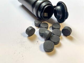 Few activated carbon pills