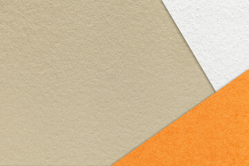 Texture of craft beige color paper background with white and orange border. Vintage abstract sand cardboard.