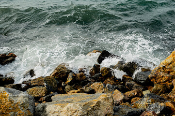 Istanbul sea waves crashing on rocks