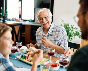 senior mature elderly couple active family lunch food man meal eating mother dinner father grandfather grandmother home table parent grandparent - Powered by Adobe