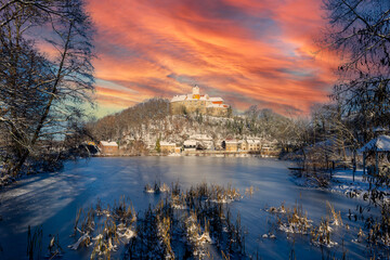 Schoenfels Castle in Saxony at sunset in winter with castle pond © Animaflora PicsStock