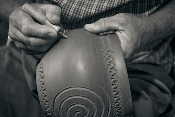 master potter while modeling Vadastra Ceramica clay vessels