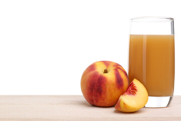 Glass of delicious peach juice and fresh fruit on wooden table against white background