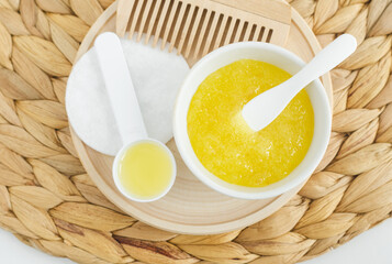 Homemade lemon, honey and sugar scrub for face, foot and body. Natural beauty treatment and spa recipe. Top view.