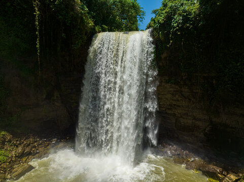 Beautiful waterfall in forest the Hikong Alo Falls. Lake Sebu. Mindanao, Philippines.