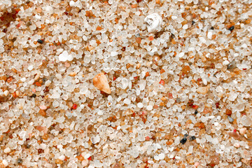 Coarse-grained beach sand texture of the Atlantic Ocean