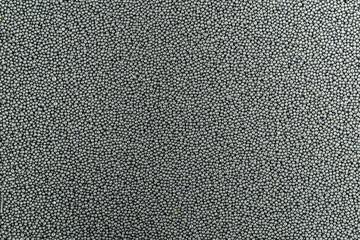 Photo background texture of gunpowder for loading cartridges on a rifles.