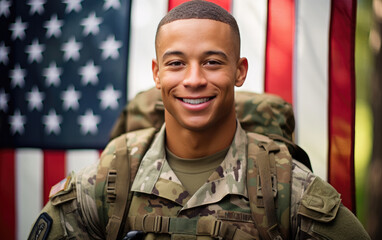 Happy smiling soldier with camouflage in the flag background